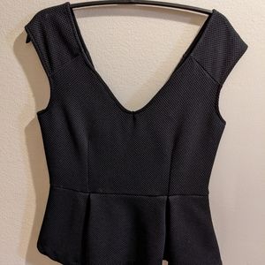 Black sleeveless peplum top
